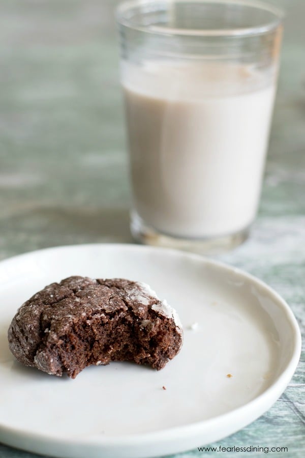 A brookie cookie on a plate. The cookie has a bite taken out.