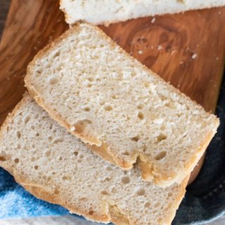 sliced sourdough bread loaf on a cutting board