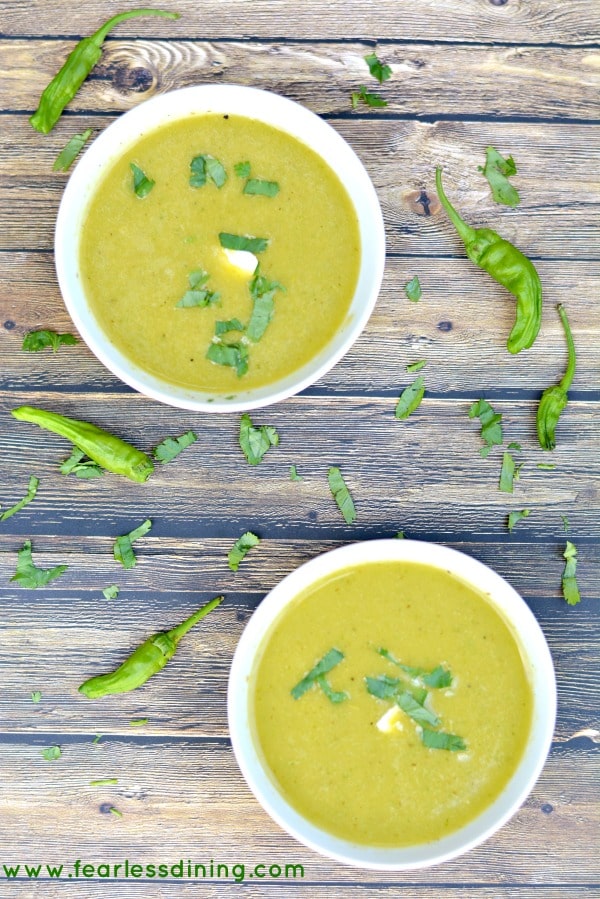 Two bowls of chilled shishito peppers soup.