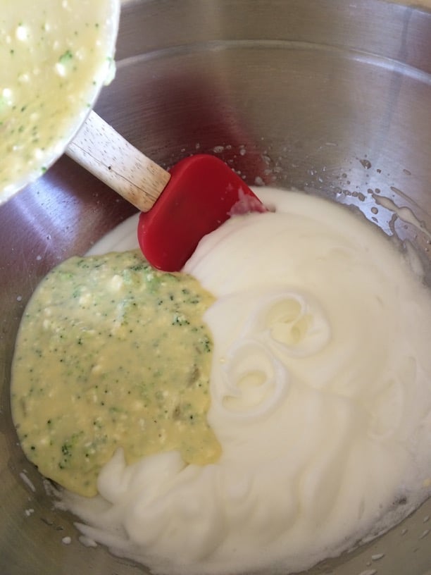 Mixing souffle base in with the egg whites