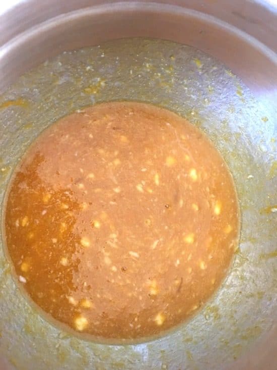 The pumpkin wet ingredients in a large mixing bowl.