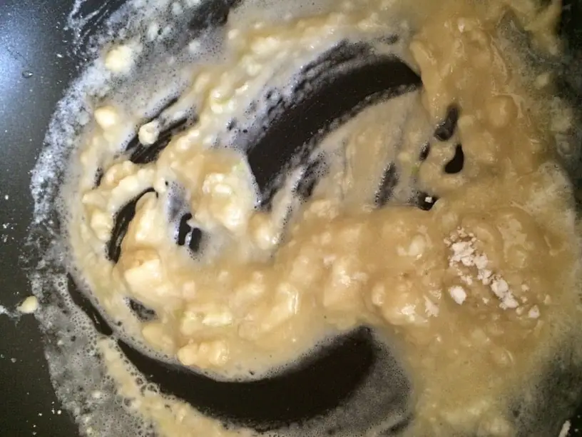 gluten free roux simmering in a pan