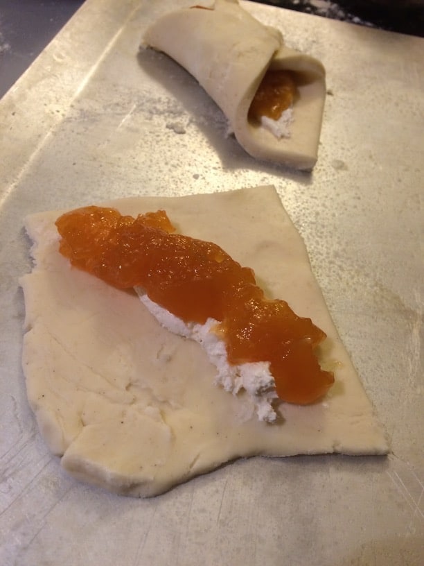 Adding jam to the gluten free pastry dough to make gluten free pastries