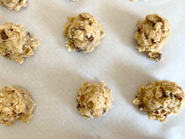 Cookie dough balls ready to bake in the oven.