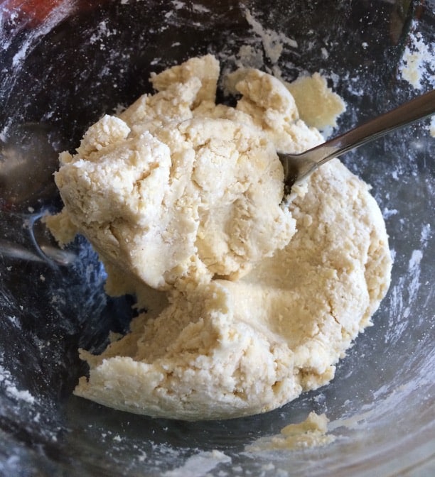 Tart crust dough mixed up in a bowl.