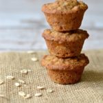 3 gluten free banana muffins stacked.