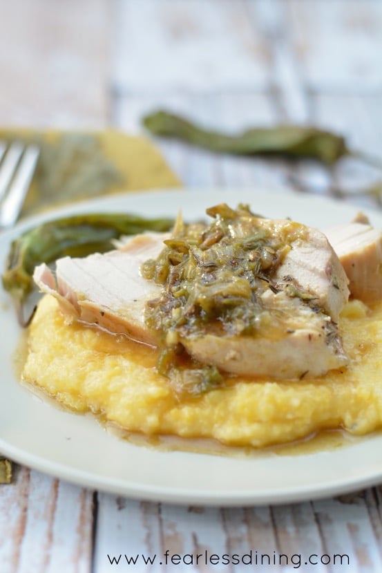 Close up of Chicken with Shishito Pepper Sauce Over Polenta 