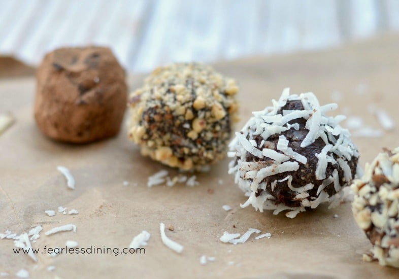 Super creamy dark chocolate truffles. Tons of options to coat these bites of chocolate heaven! Recipe at https://www.fearlessdining.com
