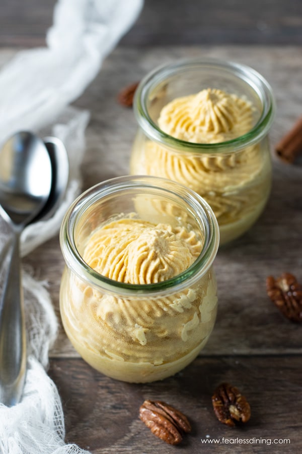 Two glasses of pumpkin mousse ready to eat.