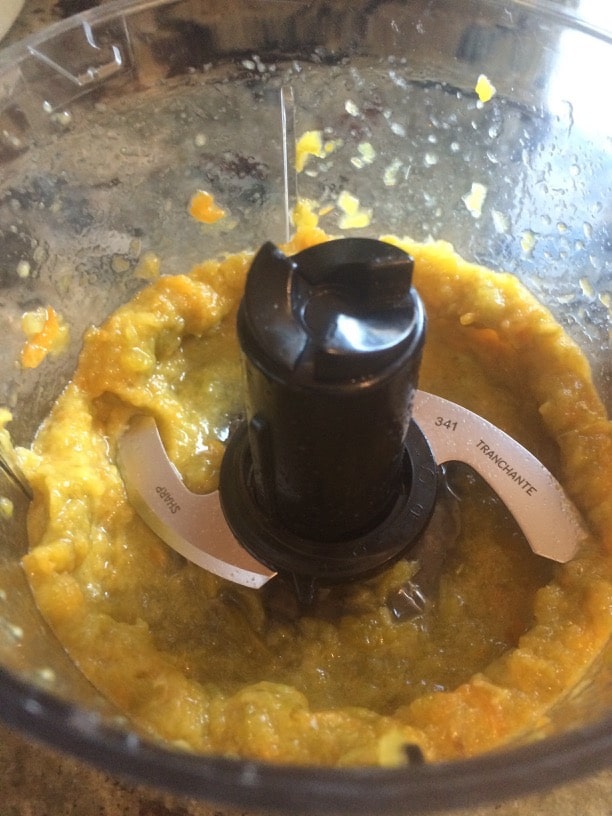 Hatch chiles pureed in a Cuisinart food processor.
