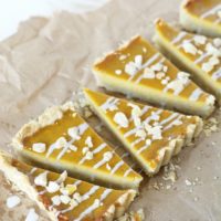 A hero image of the sliced butternut squash dessert tart.