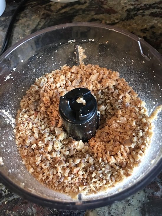 The ground chestnuts in the grinder.