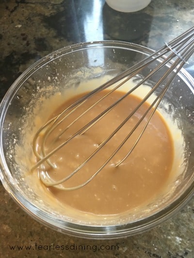 Peanut Butter Glaze in a mixing bowl