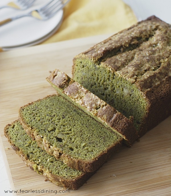 Top view of a loaf of Gluten Free Matcha Banana Bread sliced 