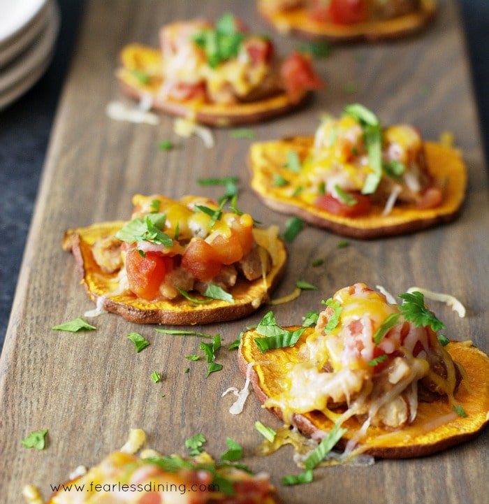 Sweet potato nachos on a wood cutting board