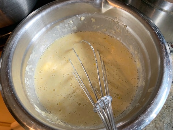 wet ingredients in a bowl whisked.