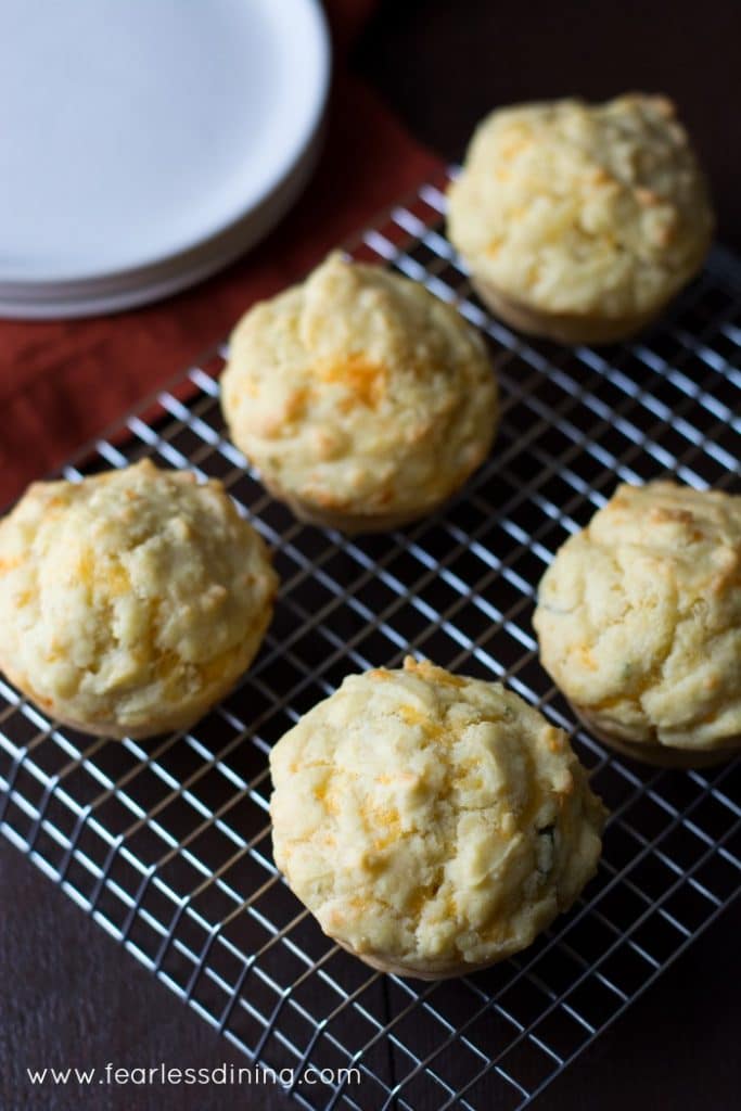 Gluten Free Cheddar Herb Muffins on a cooling rack.