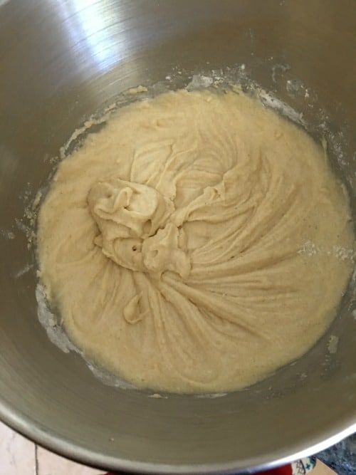Peanut butter cheesecake wet ingredients mixed in a bowl.