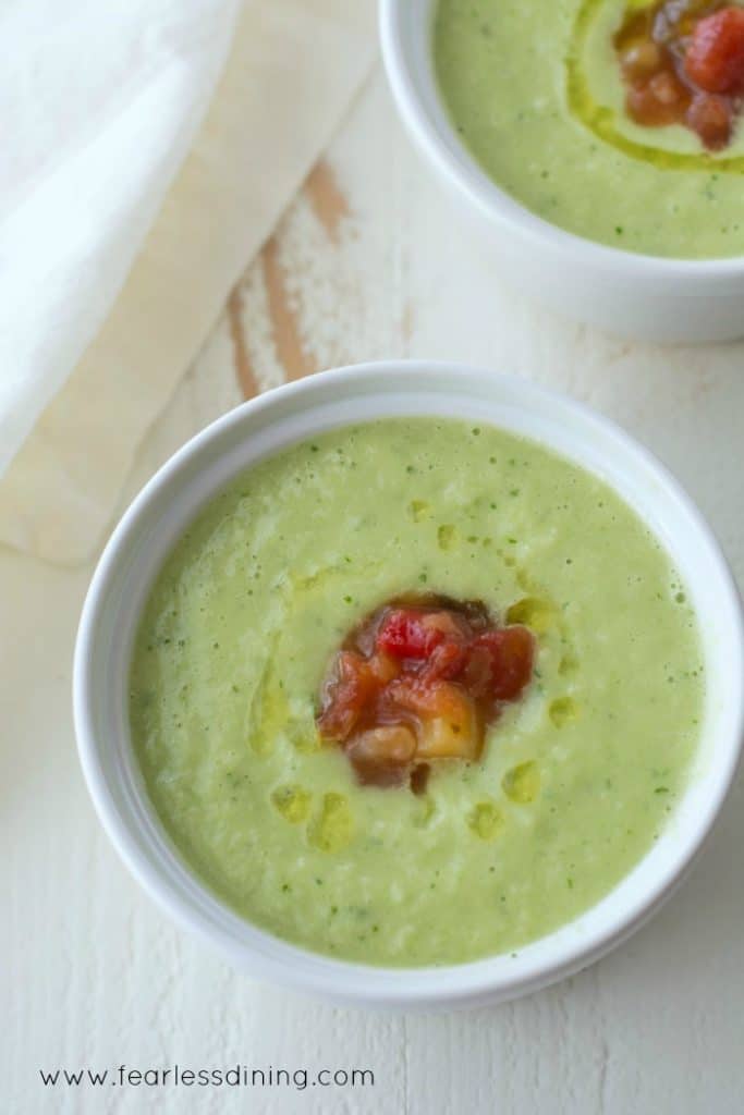 Cucumber Avocado Gazpacho in two white bowls.