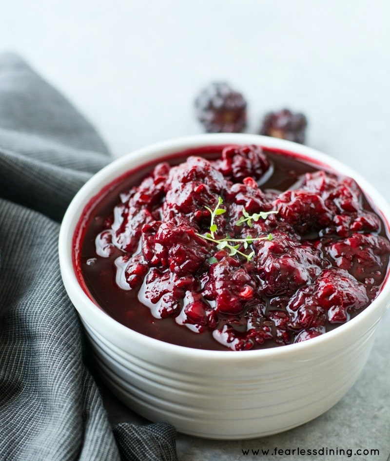 A bowl of olallieberry thyme sauce.