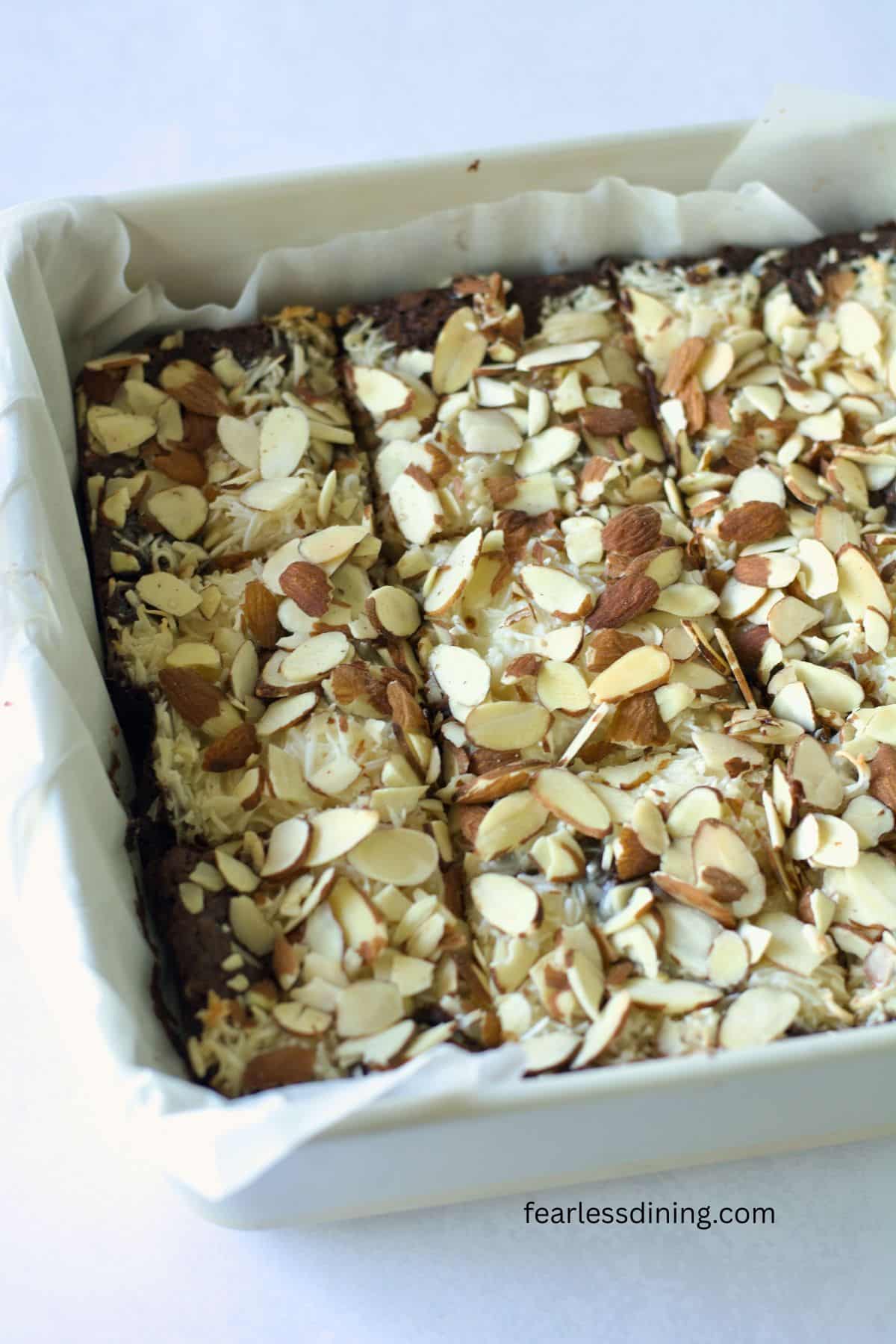 A pan of baked gluten free Almond Joy cookie bars.