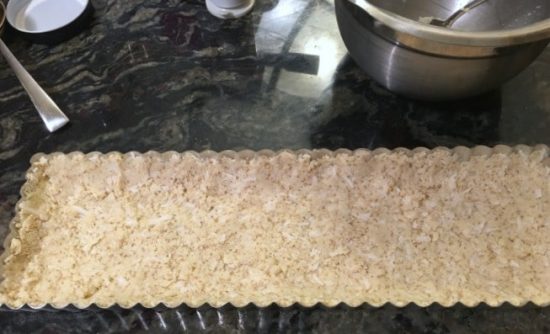 Crust pressed into a tart pan