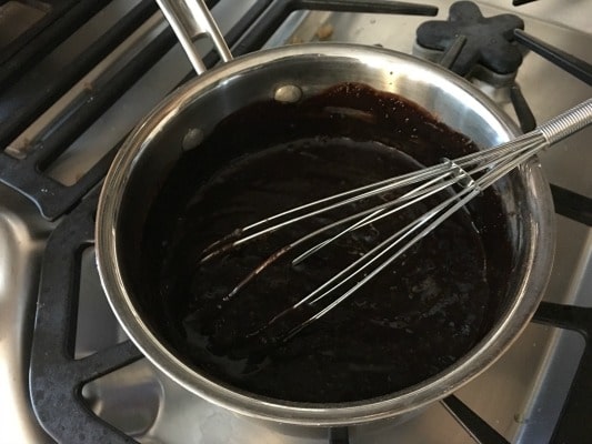 Cooking the chocolate custard.