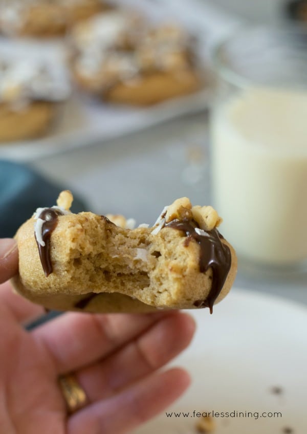 Gluten free banana donut with a bite taken out.