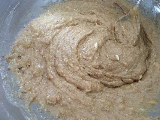 Gluten free banana donut batter in a bowl.