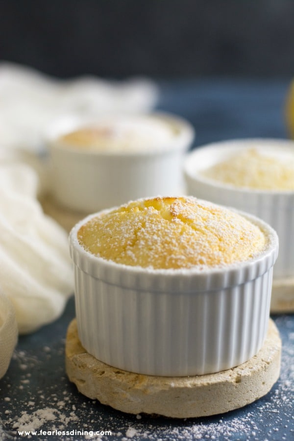 Gluten Free Lemon Sour Cream Cakes in a ramekin dish.