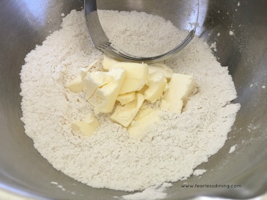 Cutting butter into dry ingredients to make an easy gluten free pie crust recipe