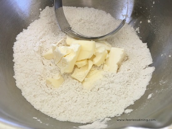 Cutting butter into flour.