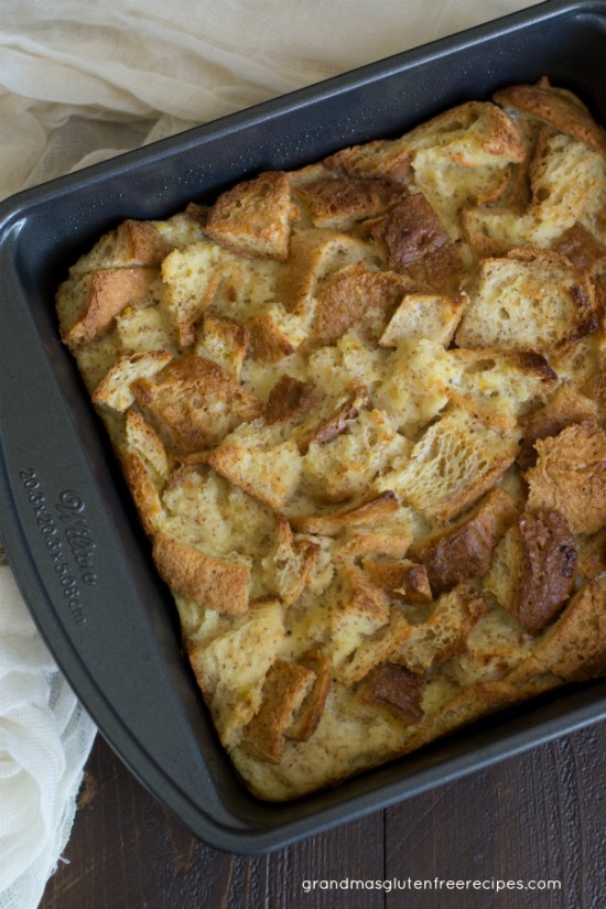 The baked bread pudding in an 8x8 pan.