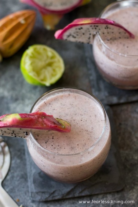 The top view of two dragon fruit cocktails.