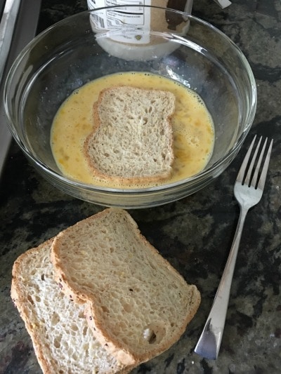 Bread soaking in egg whites.