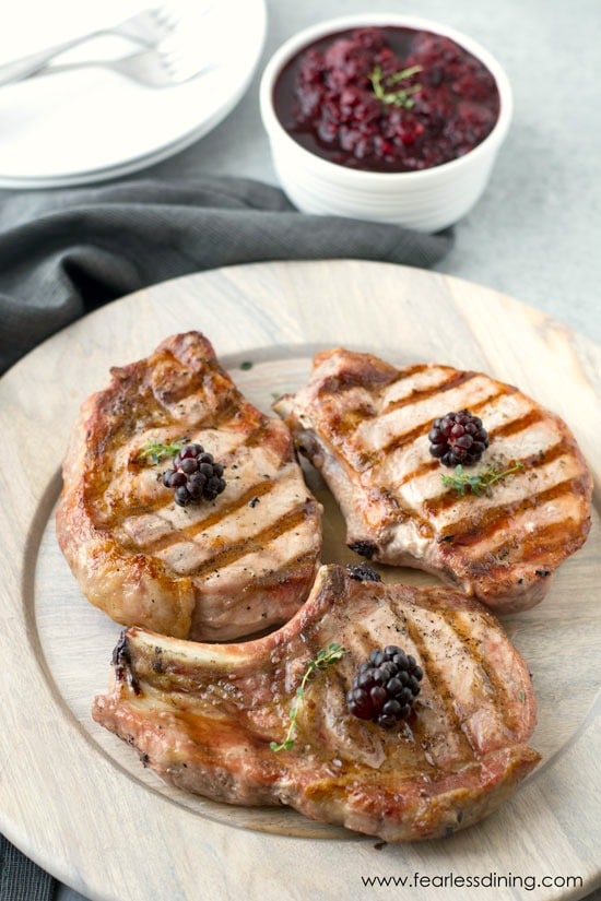 Grilled pork chops on a plate.