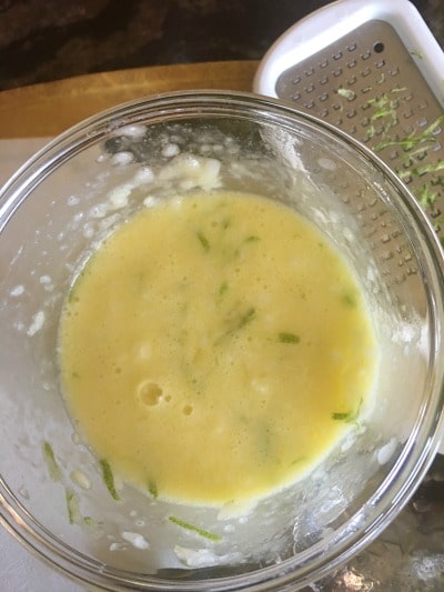 Lime cake batter in a bowl.