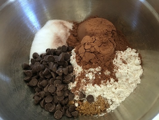 Edible cookie dough dry ingredients in a bowl. Sugar, cocoa, flour, sugar and chocolate chips!