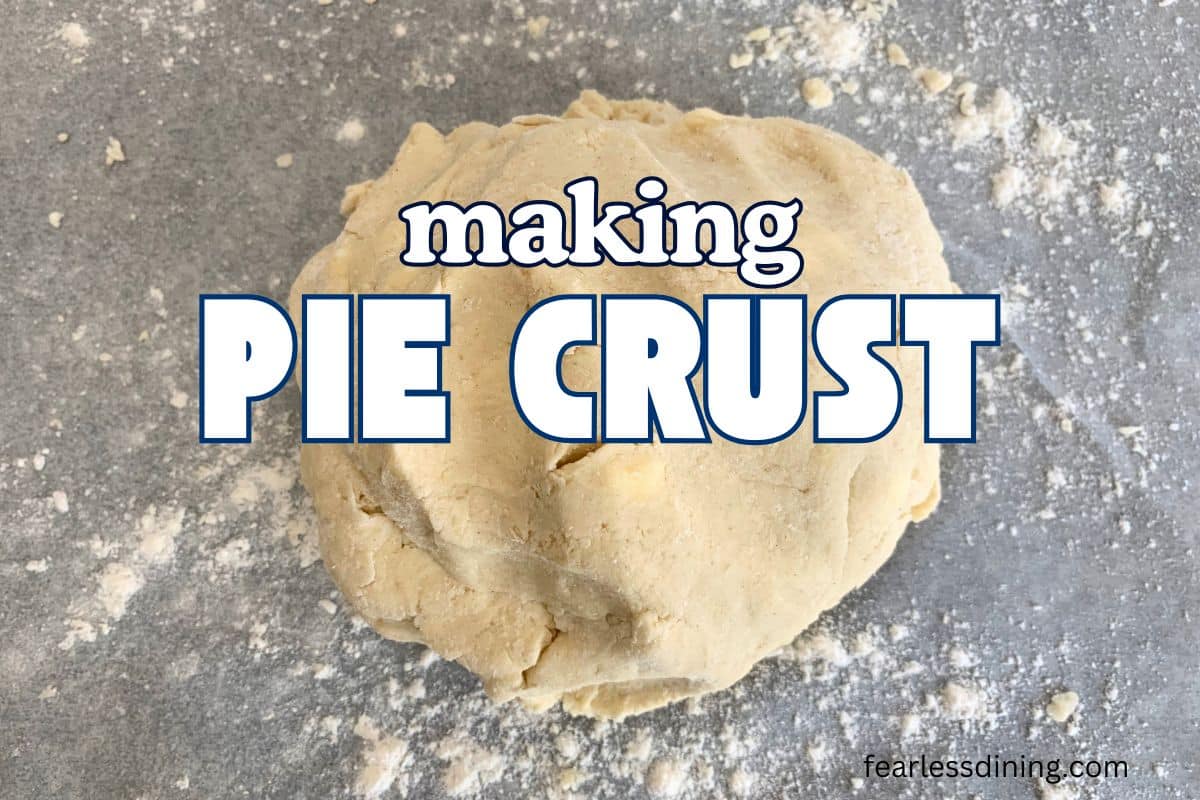 A photo of pie crust on a flour dusted silicone mat.
