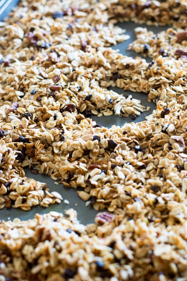 Homemade gluten free granola on a baking sheet. 