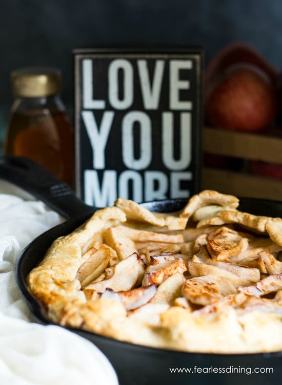 A photo of the baked gluten free apple galette in the cast iron skillet.