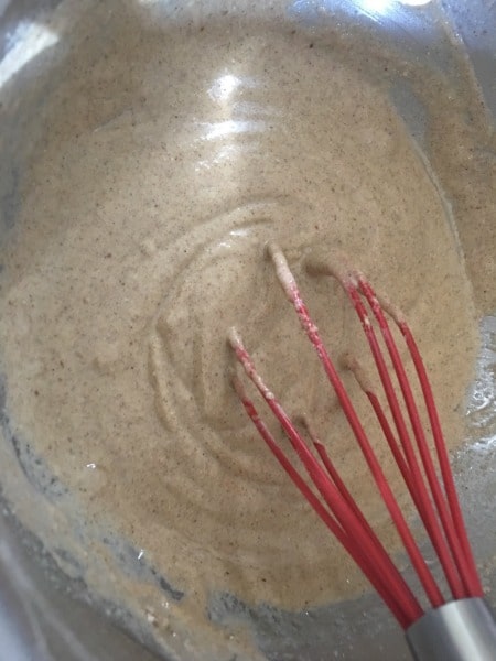 Batter in a bowl for a paleo waffle recipe made with banana flour.