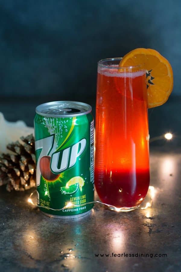 A tall glass of the cranberry simple syrup and 7 Up.