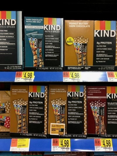 Boxes of gluten free Kind snack bars.