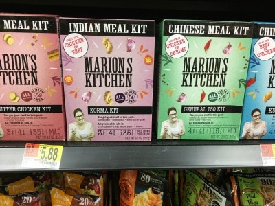 A shelf at Walmart with gluten free Indian meal kits.