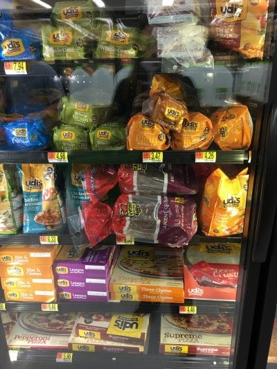 A freezer case at Walmart full of gluten free foods.