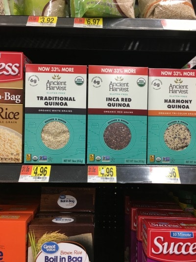 a shelf with boxes of quinoa