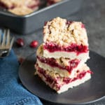 A stack of three gluten-free cranberry bars.