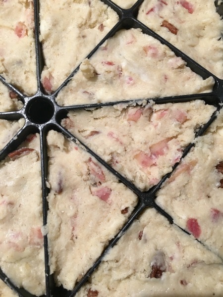 Scone batter in a scone pan.