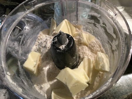 butter, almond flour, and gluten free flour in a food processor